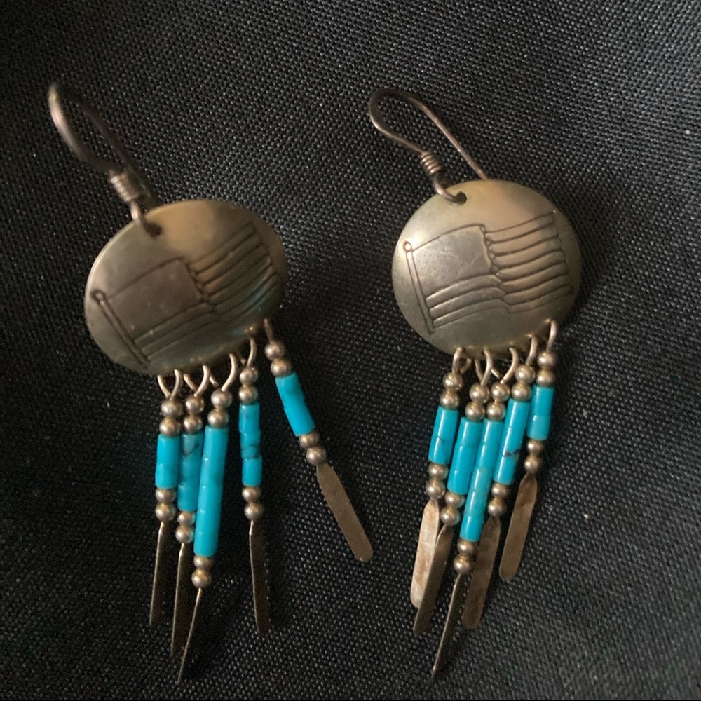 Earrings with turquoise colored beads